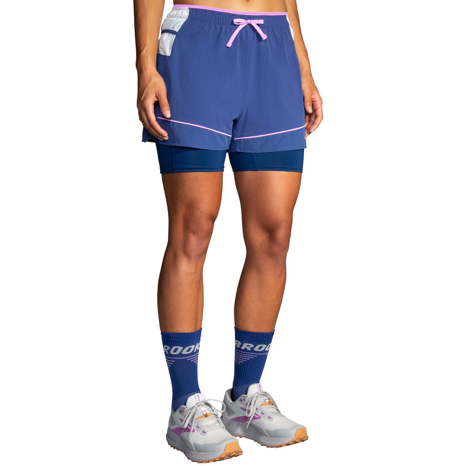 Front view of a model wearing a pair of Brooks Women's High Point 3