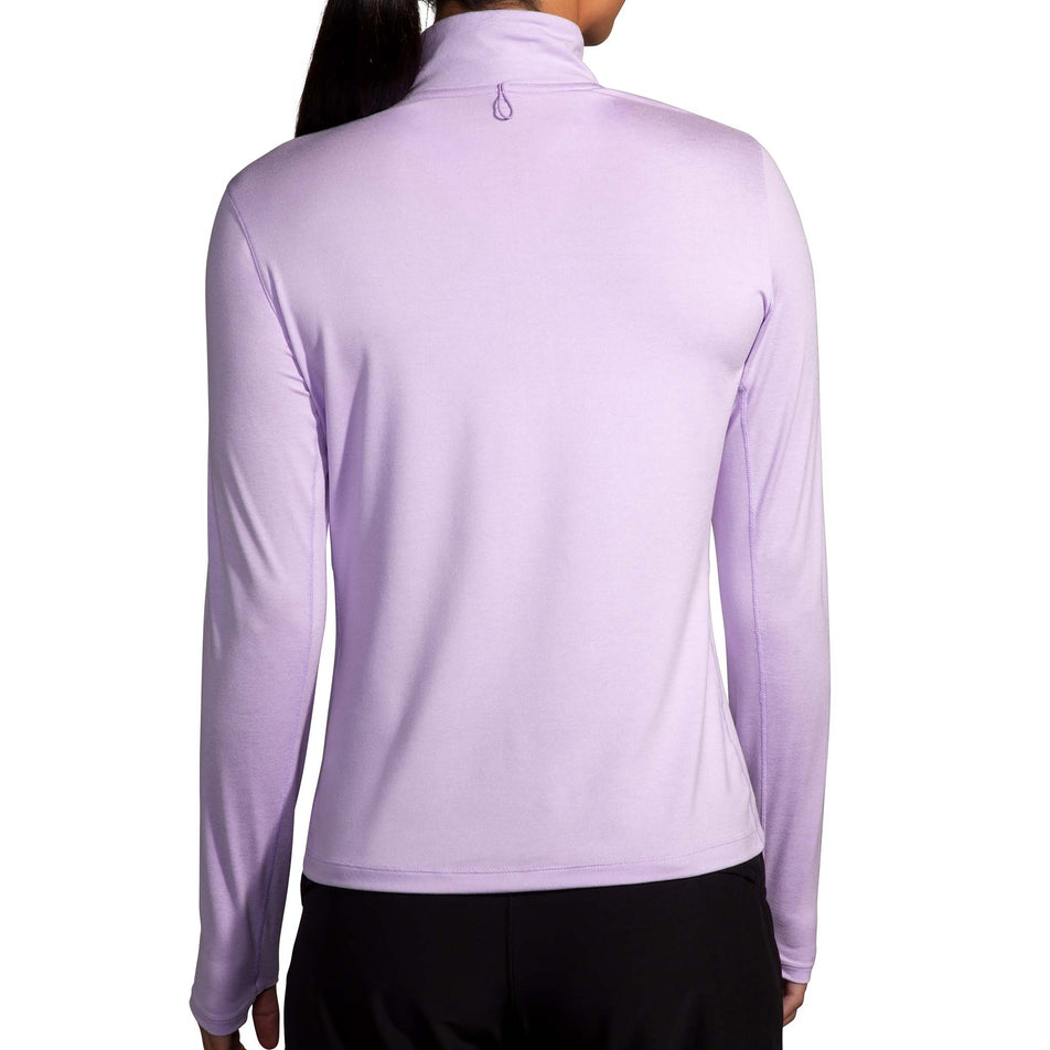 Back view of a model wearing a Women's Dash 1/2 Zip 2.0 in the Heather Purple colourway. Model is also wearing Brooks legwear. (8177476665506)