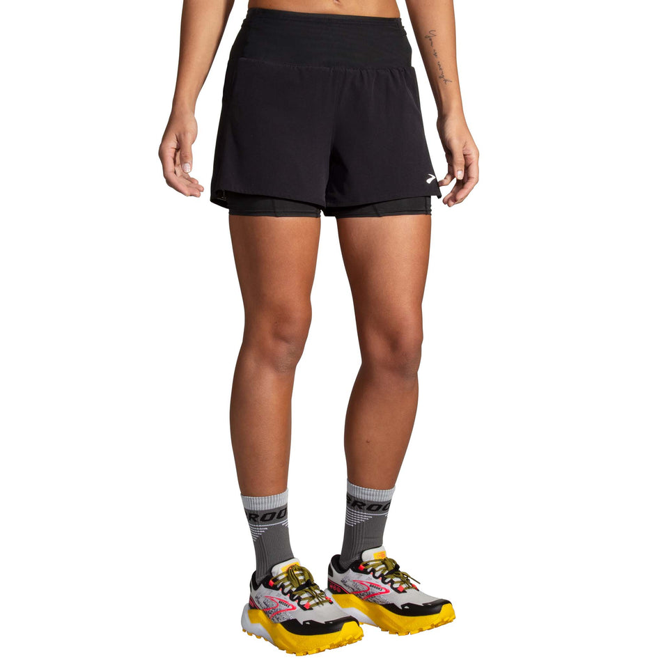 Front view of a model wearing the Brooks Women's High Point 3