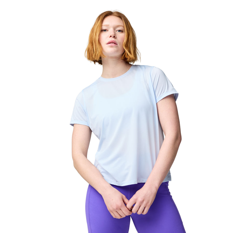 Front view of a model wearing the Brooks Women's Dash Short Sleeve in the Halogen Blue colourway.
