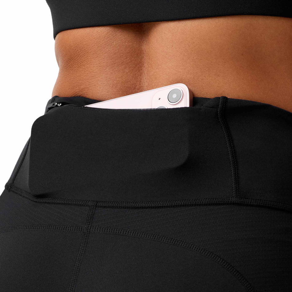 The zip pocket on the Brooks Women's Dash Cooling Short in the Black colourway.