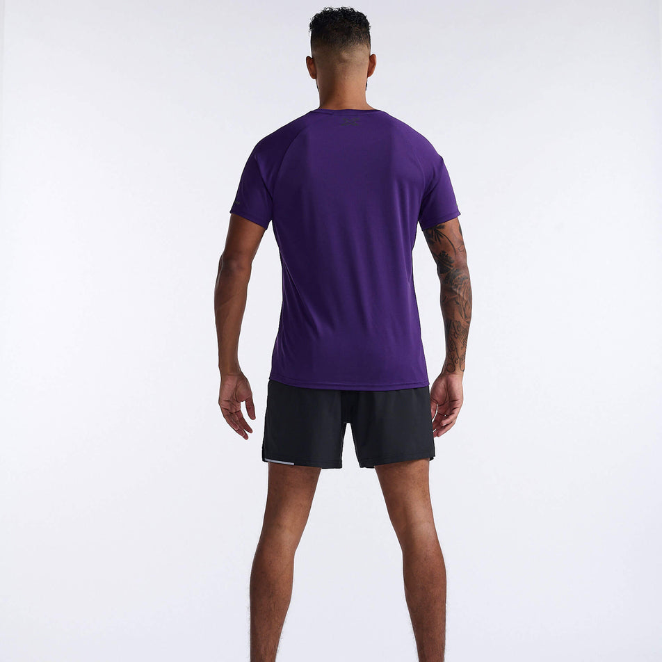 Back view of a model wearing a 2XU Men's Aero Tee in the Acai/Black Reflective colourway. Model is also wearing 2XU shorts (8248600920226)
