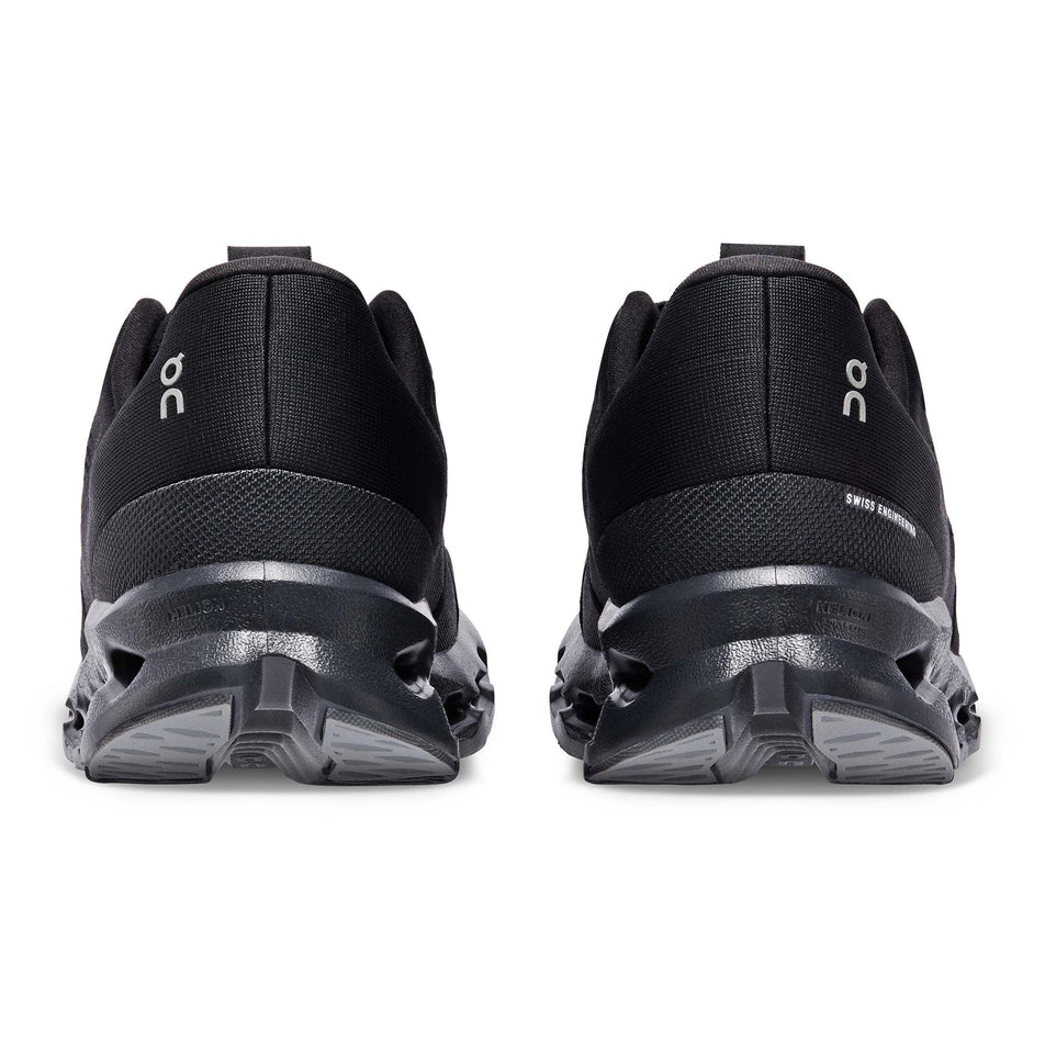 The back of a pair of On Men's Cloudsurfer Running Shoes in the All Black colourway (7986198053026)