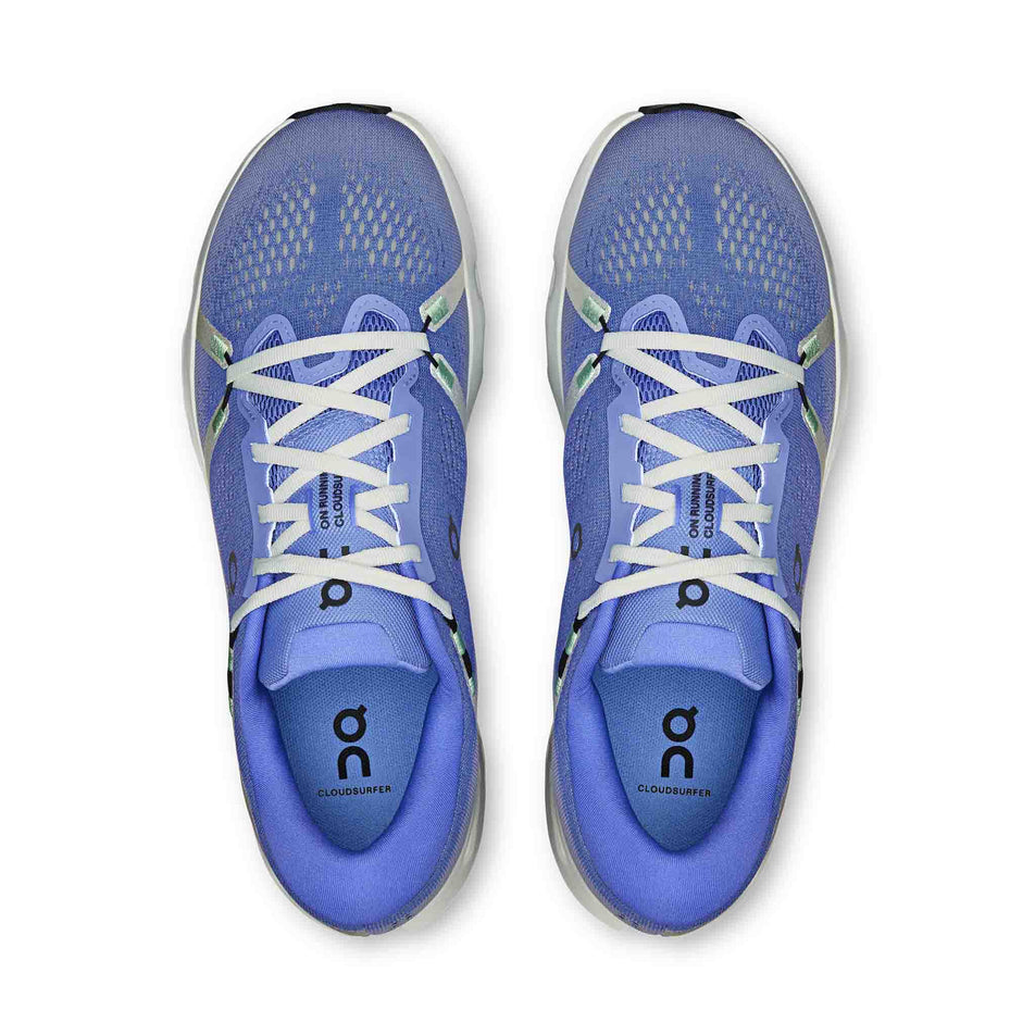 The uppers of a pair of On Men's Cloudsurfer 2 Running Shoes in the Sailor/Ivory colourway.