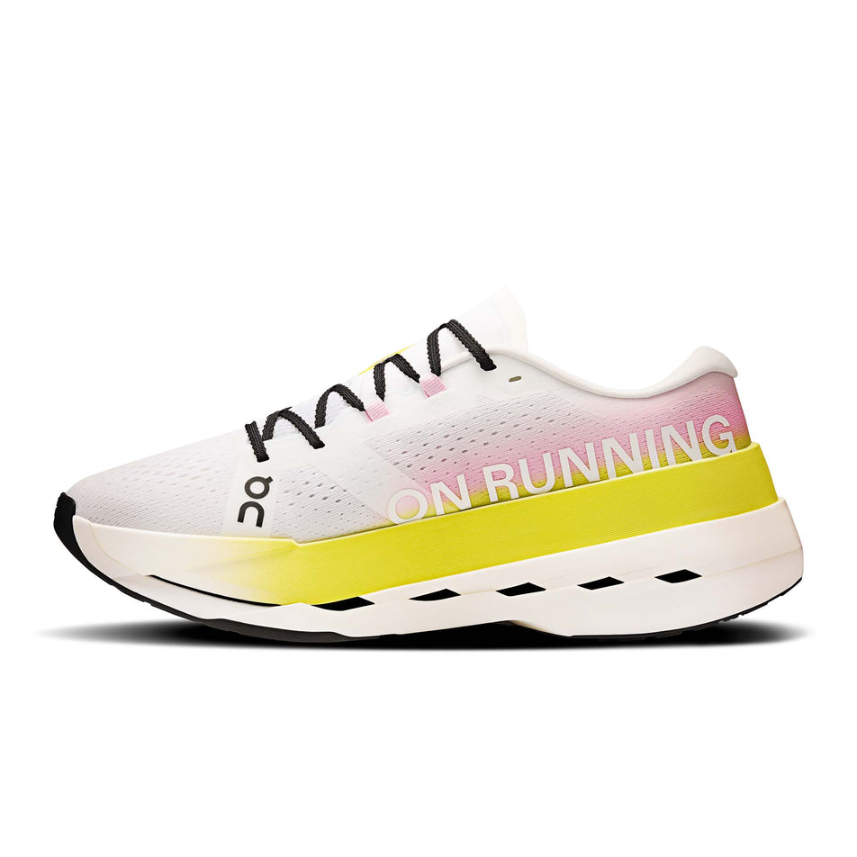 Medial view of the right shoe from a pair of On Men's Cloudboom Max Running Shoes in the Lime/Raspberry  colourway. (8746021683362)