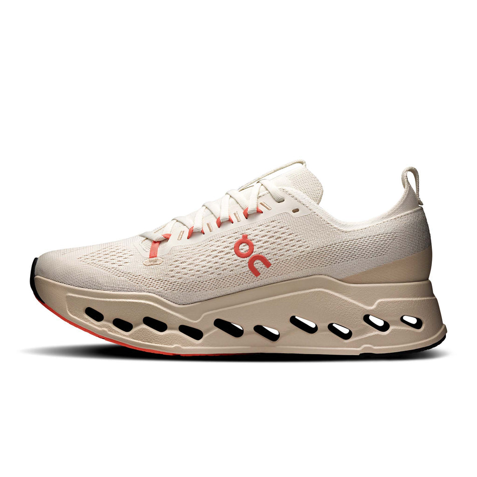 Medial view of the right shoe from a pair of On Men's Cloudsurfer Max Running Shoes in the Ivory/Salmon colourway. (8714501882018)