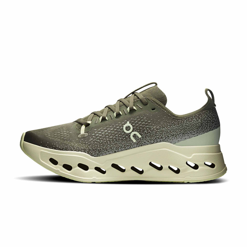 Medial view of the right shoe from a pair of On Men's Cloudsurfer Max Running Shoes in the Olive/Seedling colourway. 