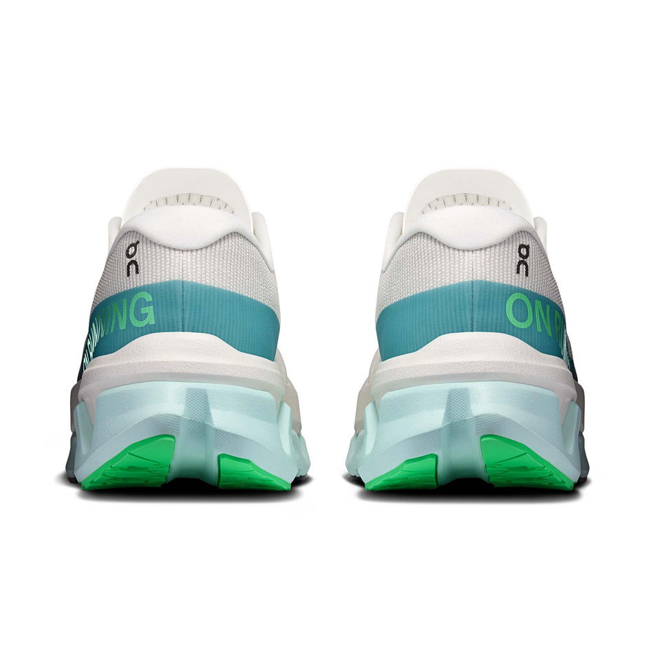 The back of a pair of On Men's Cloudmonster 3 Hyper Running Shoes in the Ivory/Flurry colourway.