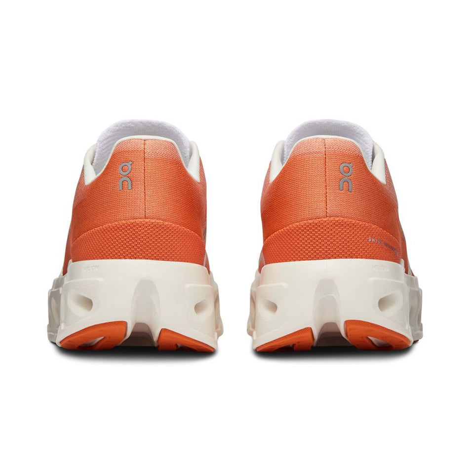 The back of a pair of On Women's Cloudeclipse Running Shoes in the Flame/Ivory colourway (8092558164130)