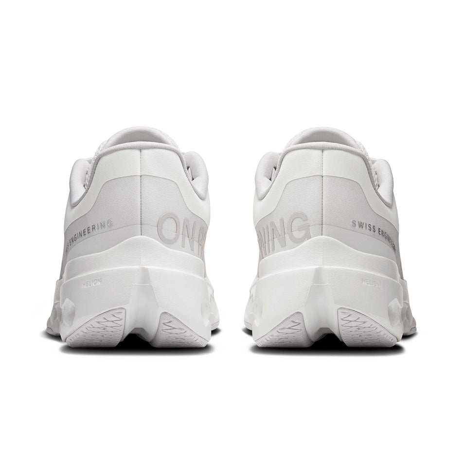 The back of a pair of On Women's Cloudsurfer Next Running Shoes in the White/White colourway.