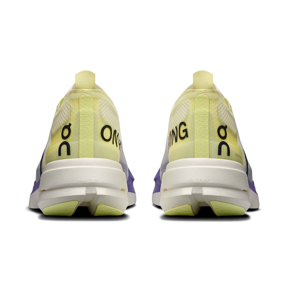 The back of a pair of On Women's Cloudboom Strike Running Shoes in the Juniper/Limelight colourway.