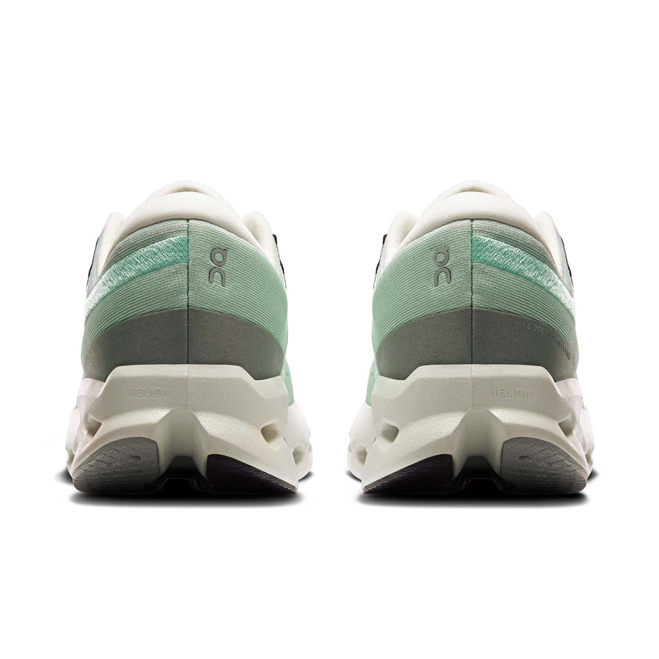 The back of a pair of On Women's Cloudsurfer 2 Running Shoes in the Ivory/Creek colourway.
