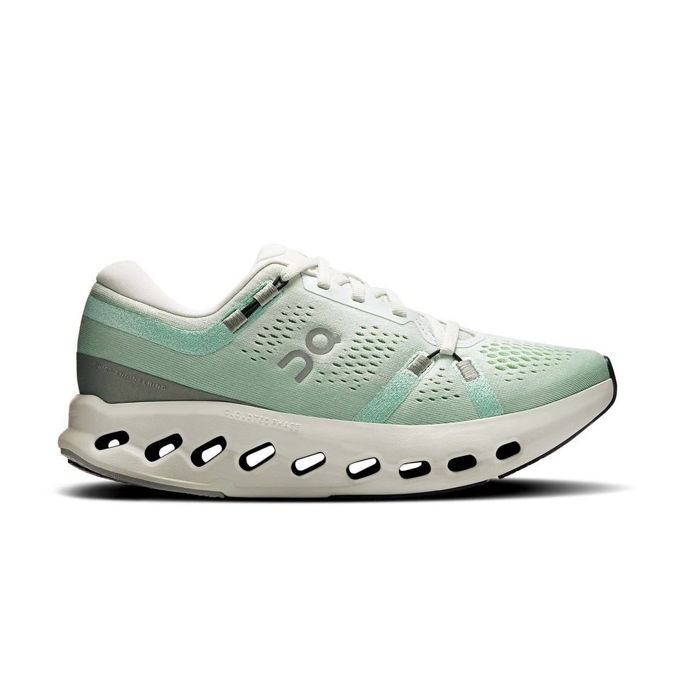 Lateral view of the right shoe from a pair of On Women's Cloudsurfer 2 Running Shoes in the Ivory/Creek colourway.