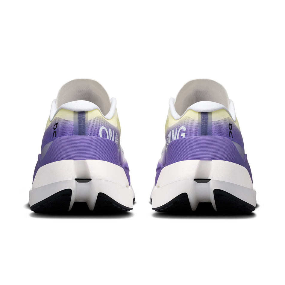 The back of a pair of On Women's Cloudboom Max Running Shoes in the White/Juniper colourway.