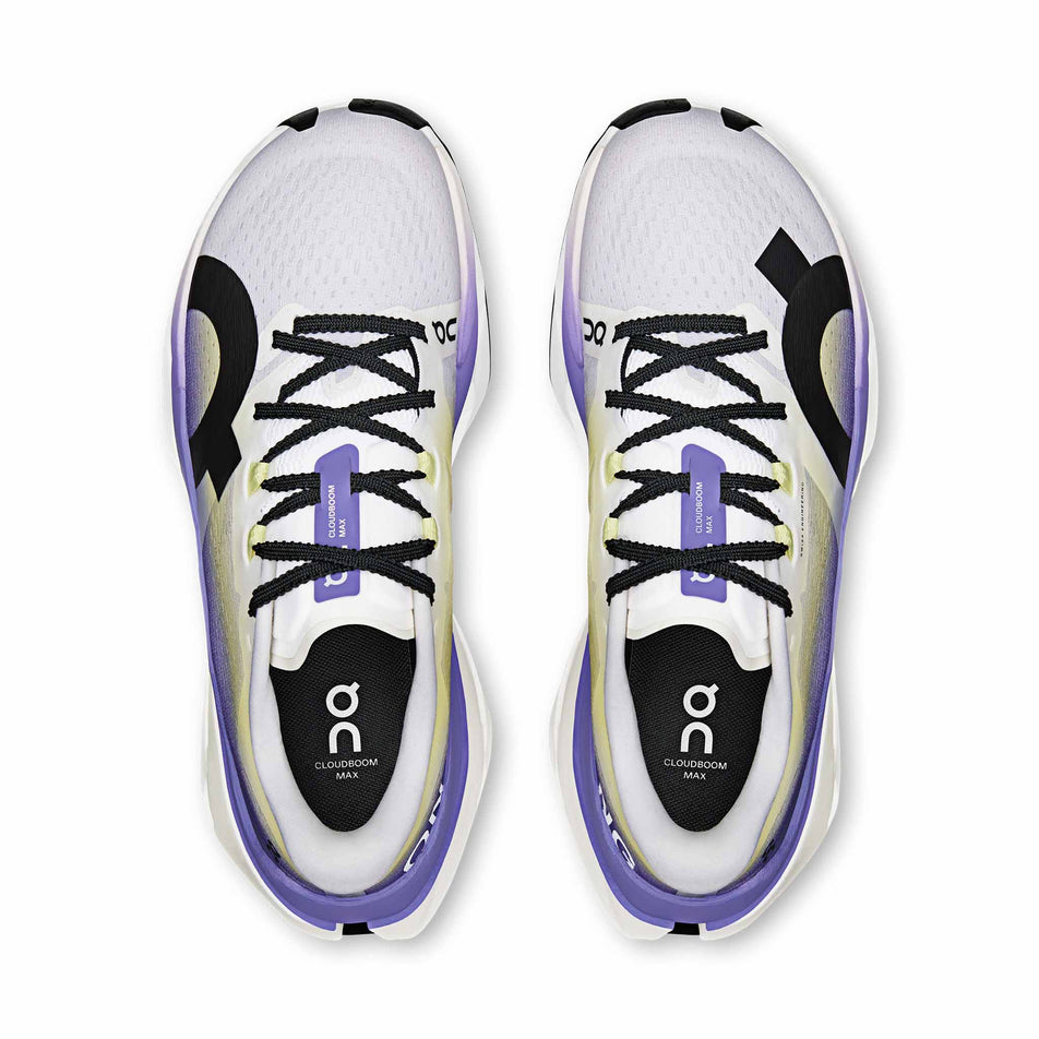 The uppers of a pair of On Women's Cloudboom Max Running Shoes in the White/Juniper colourway.