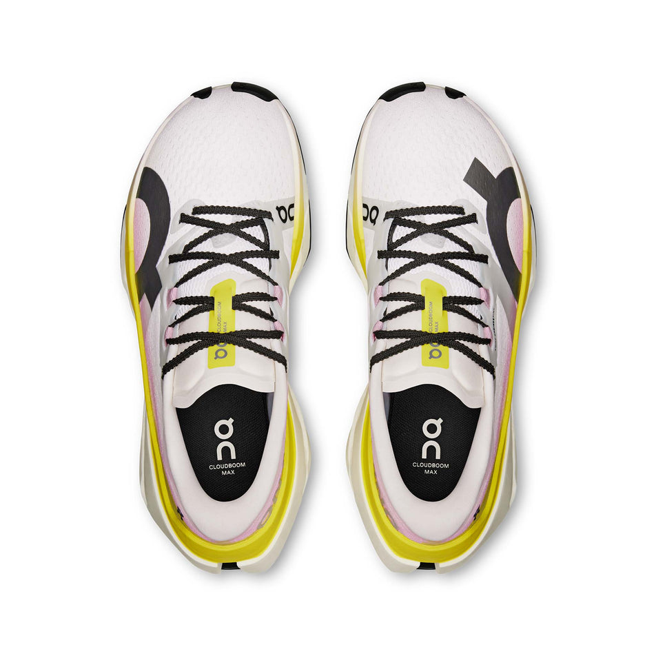 The uppers of a pair of On Women's Cloudboom Max Running Shoes in the Lime/Raspberry  colourway. (8746029416610)