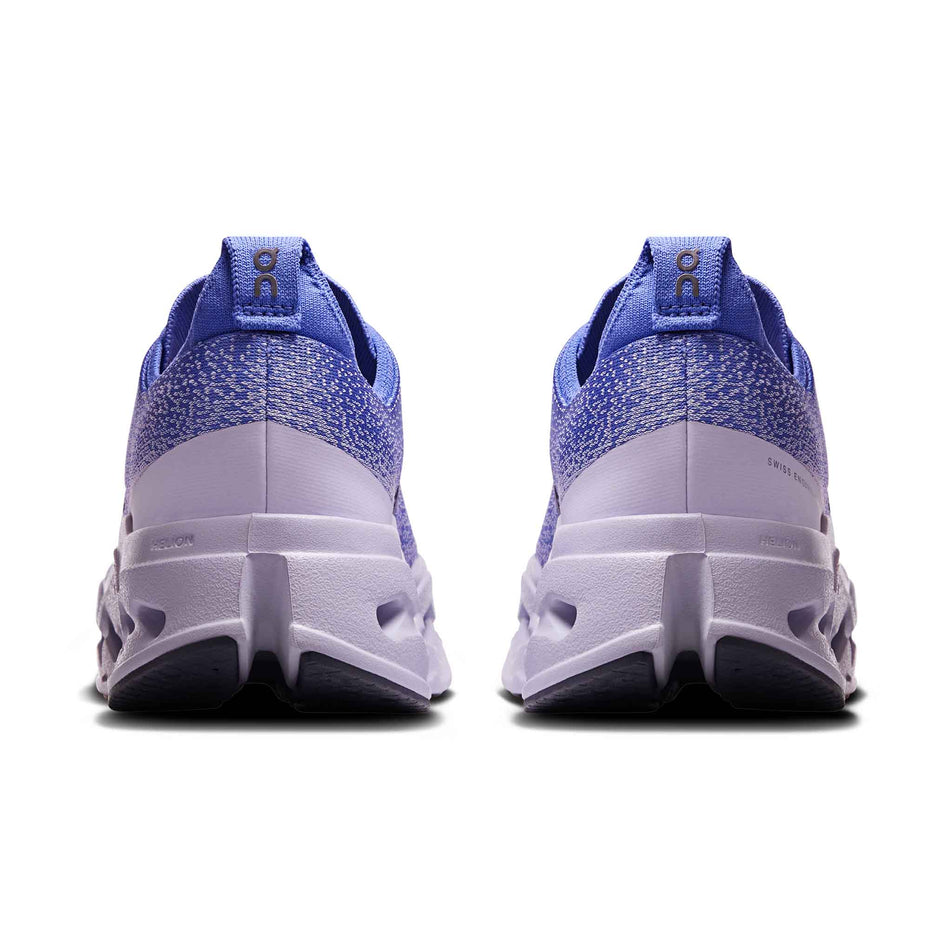 The back of a pair of On Women's Cloudsurfer Max Running Shoes in the Sailor/Thistle colourway.