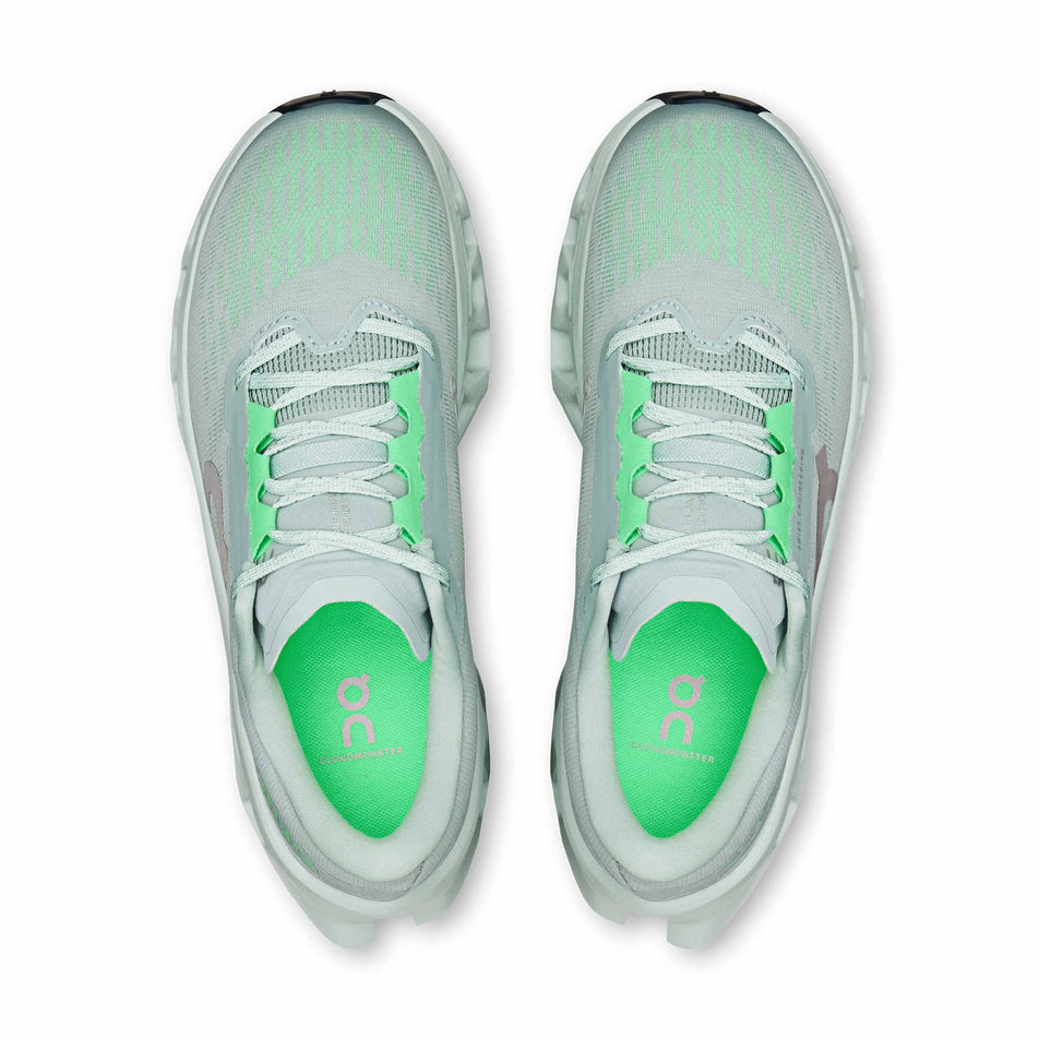 The uppers of a pair of On Women's Cloudmonster 3 Running Shoes in the Brook/Flurry colourway.