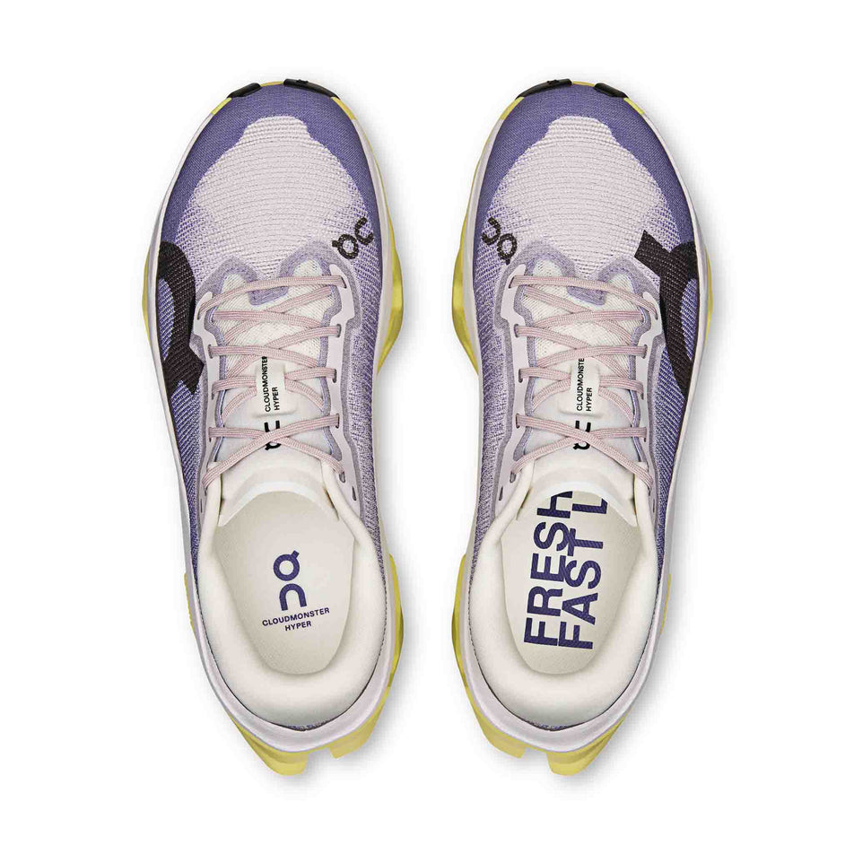 The uppers of a pair of On Women's Cloudmonster 3 Hyper Running Shoes in the Lily/Limelight colourway.