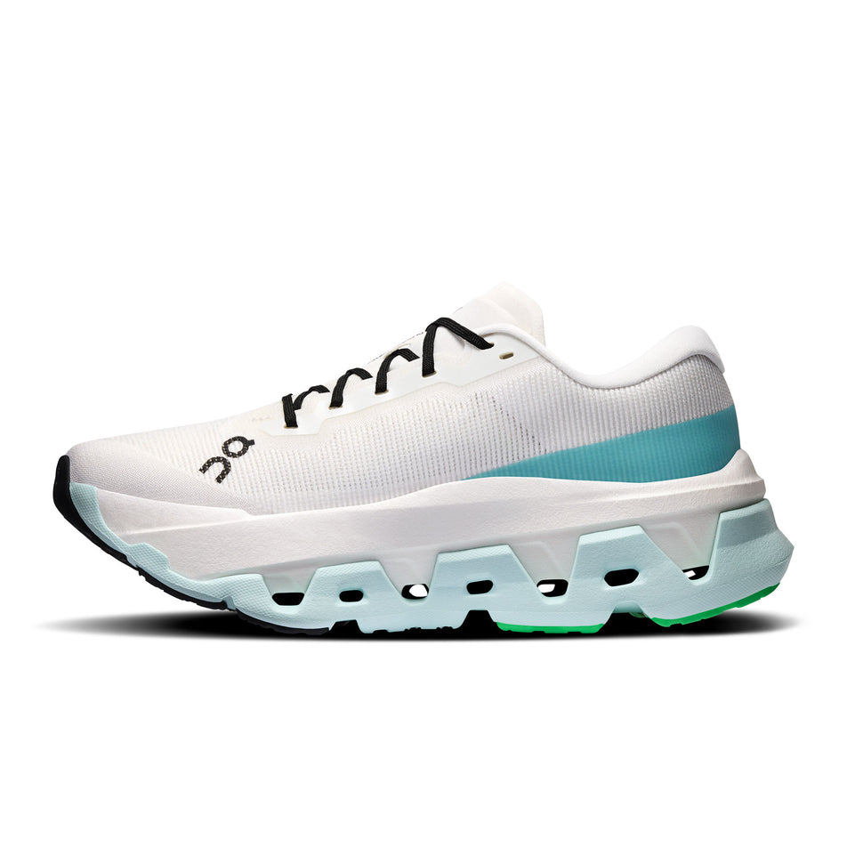 Medial view of the right shoe from a pair of On Women's Cloudmonster 3 Hyper Running Shoes in the Ivory/Flurry colourway.