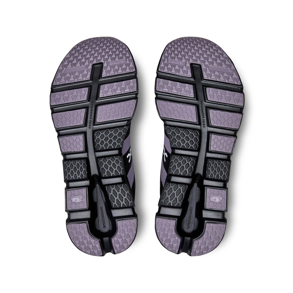 The outsoles on a pair of On Women's Cloudrunner Running Shoes in the Iron | Black colourway (7986200215714)