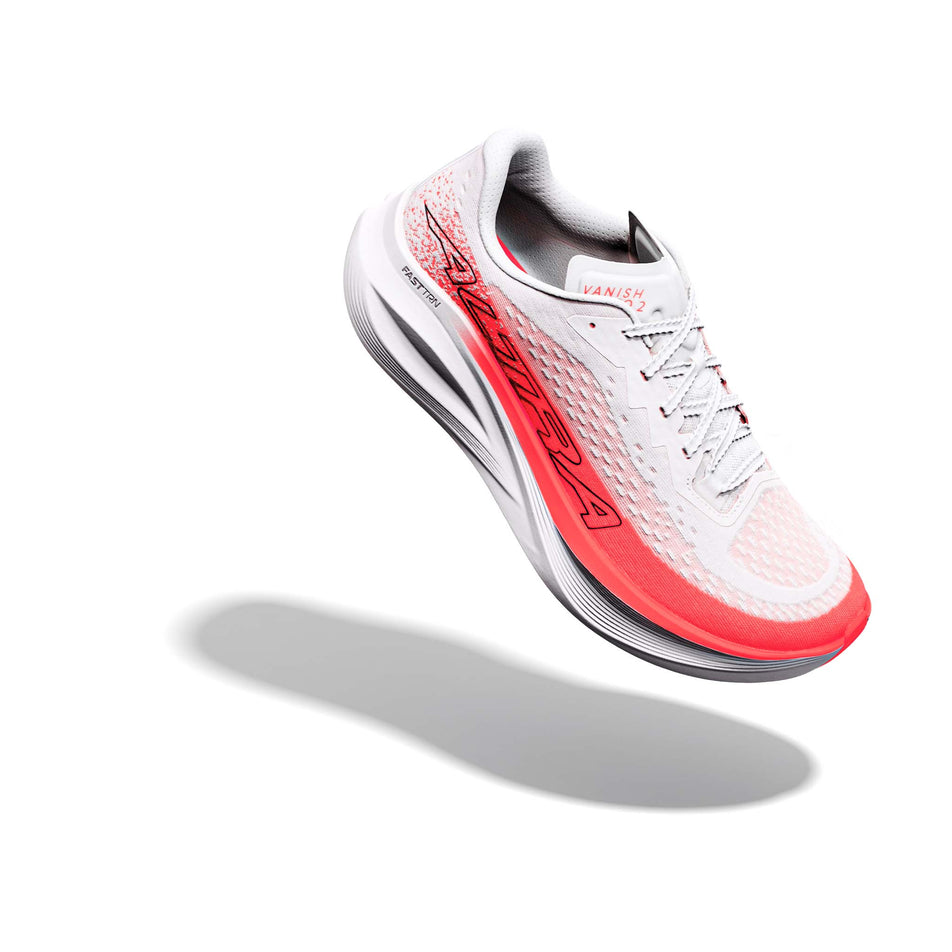 The right shoe from a pair of Altra Women's Vanish Tempo 2 in the White/Fiery Coral colourway.