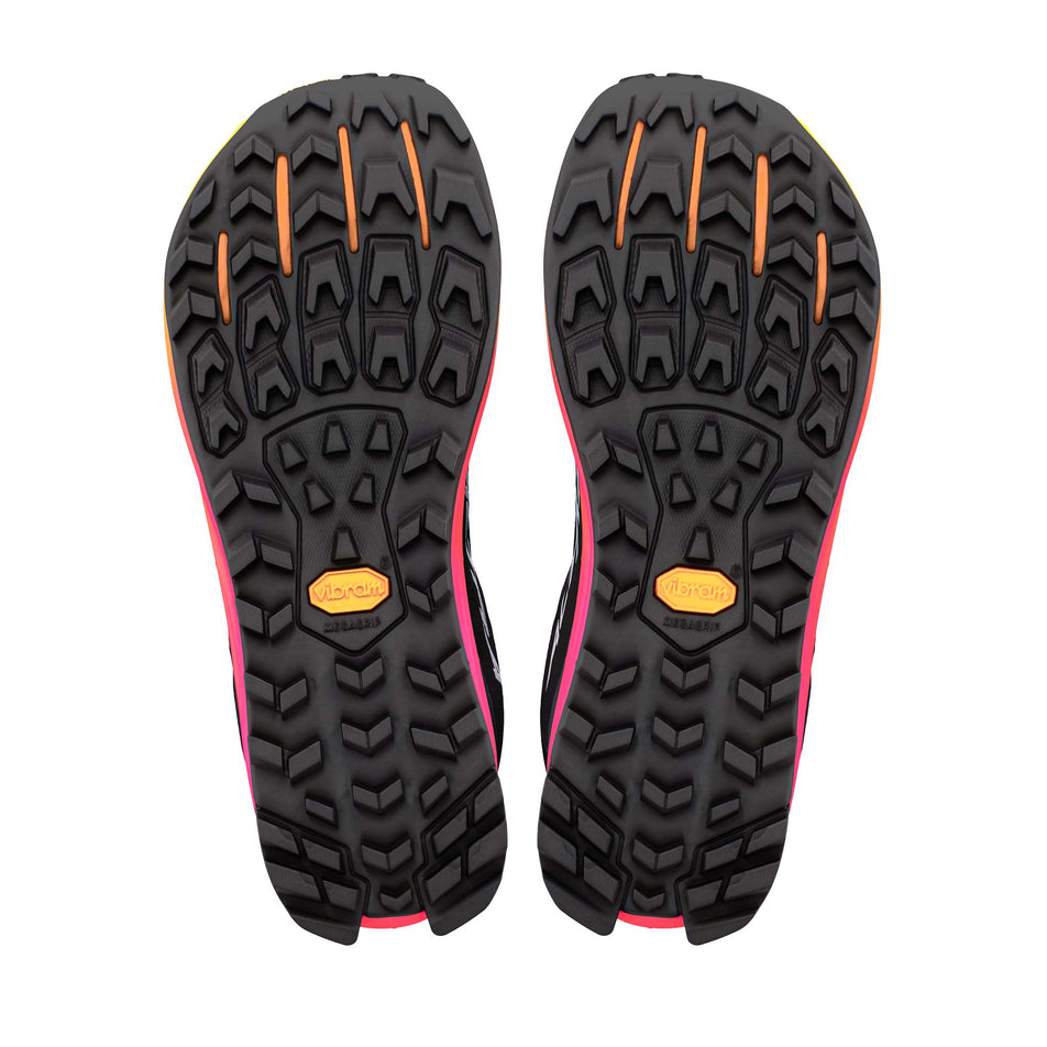 The outsoles of a pair of Altra Women's Lone Peak 9+ Running Shoes in the Black/Knockout Pink/White colourway.