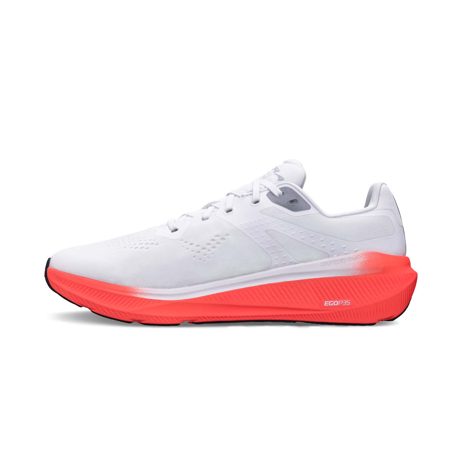 Medial view of the right shoe from a pair of Altra Men's Experience Flow ST Running Shoes in the White/Coral colourway.