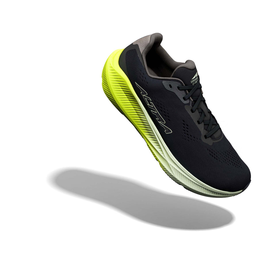 The right shoe from a pair of Altra Men's Experience Flow ST Running Shoes in the Black/Limecream/Wildlime colourway.