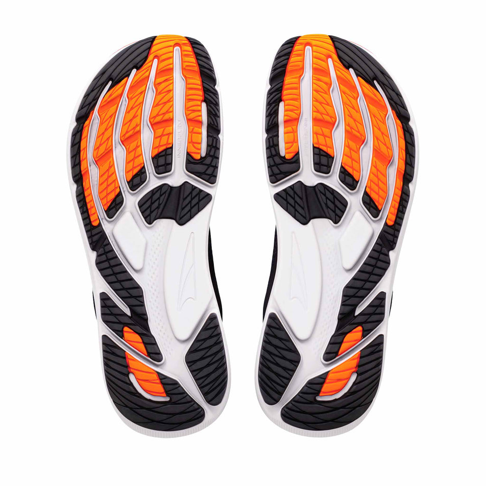The outsoles of a pair of Altra Men's FWD VIA 2 Running Shoes in the Black/Orangepop/Firycoral colourway.