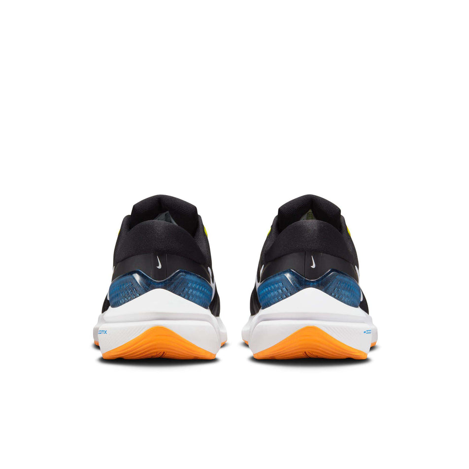The back of a pair of Nike Men's Vomero 16 Road Running Shoes in the Black/White-Sundial-High Voltage colourway (7970516500642)