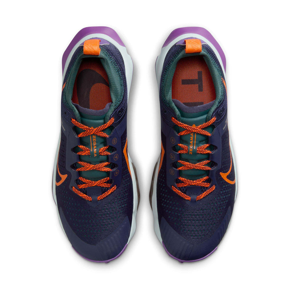 The uppers on a pair of Nike Men's Zegama Trail Running Shoes in the Purple Ink/Safety Orange-Deep Jungle colourway (8048789029026)
