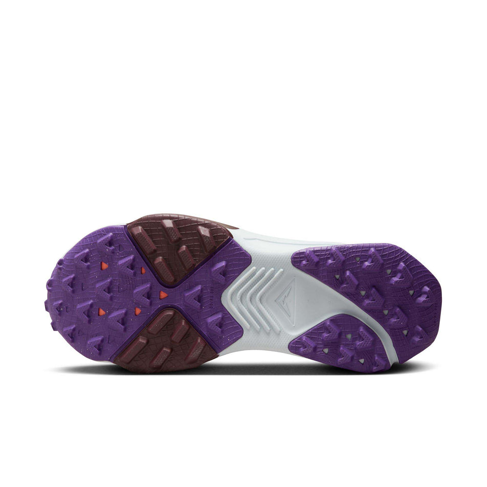 Outsole of the left shoe from a pair of Nike Women's Zegama Trail Running Shoes in the Purple Ink/Safety Orange-Deep Jungle colourway (8049474764962)