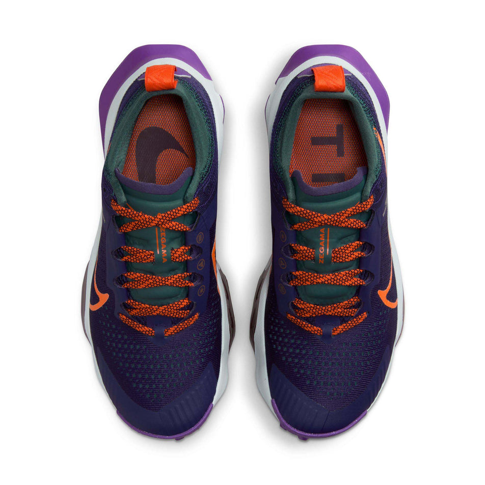 The uppers on a pair of Nike Women's Zegama Trail Running Shoes in the Purple Ink/Safety Orange-Deep Jungle colourway (8049474764962)