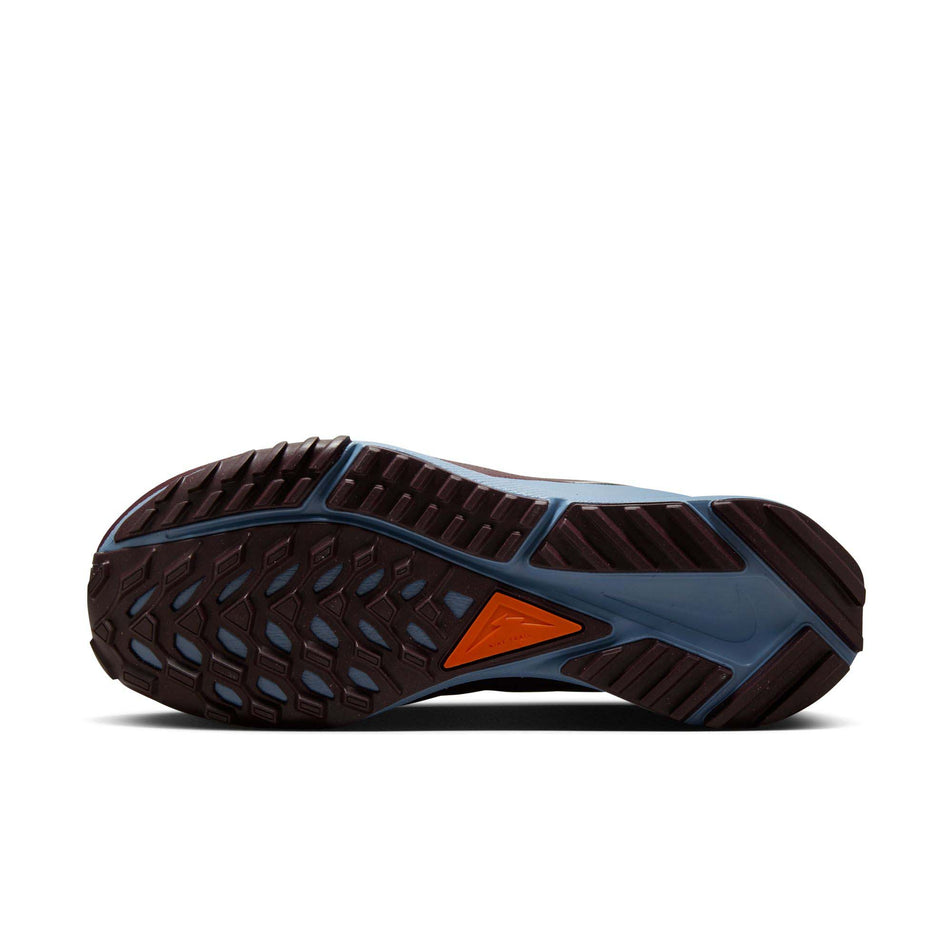 Outsole of the left shoe from a pair of Nike Women's Pegasus Trail 4 Trail Running Shoes in the Deep Jungle/Night Maroon-Khaki colourway (8049460543650)
