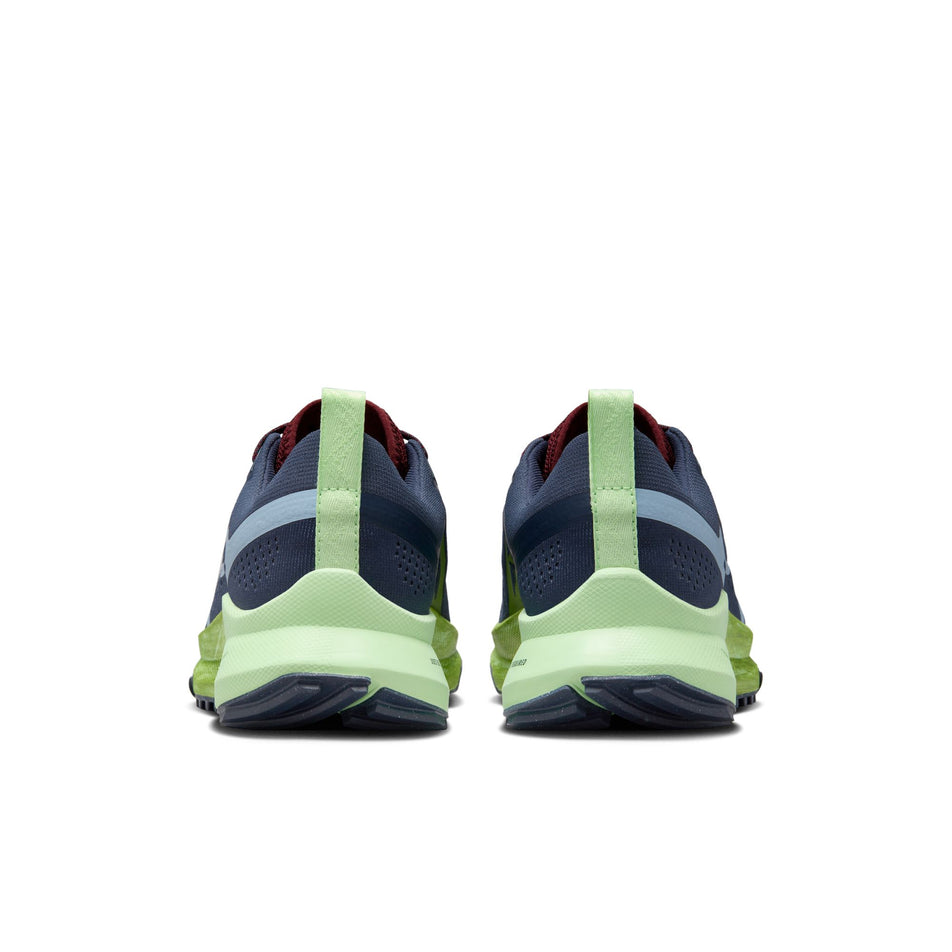 The back of a pair of Nike Women's Pegasus Trail 4 Trail Running Shoes in the Thunder Blue/Lt Armory Blue-Chlorophyll colourway (8157776347298)