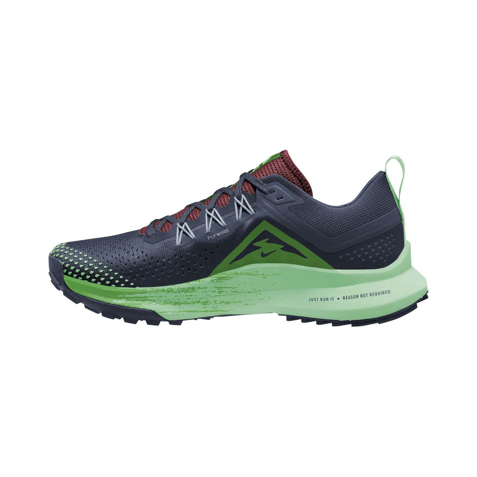 Medial side of the right shoe from a pair of Nike Women's Pegasus Trail 4 Trail Running Shoes in the Thunder Blue/Lt Armory Blue-Chlorophyll colourway (8157776347298)