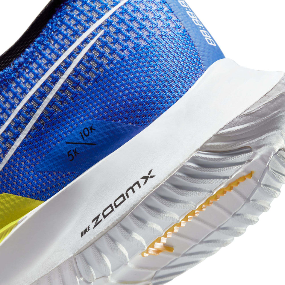 Lateral side of the left shoe's heel, from a pair of Nike Men's Streakfly Road Racing Shoes in the Racer Blue/White-Black colourway (7970596716706)