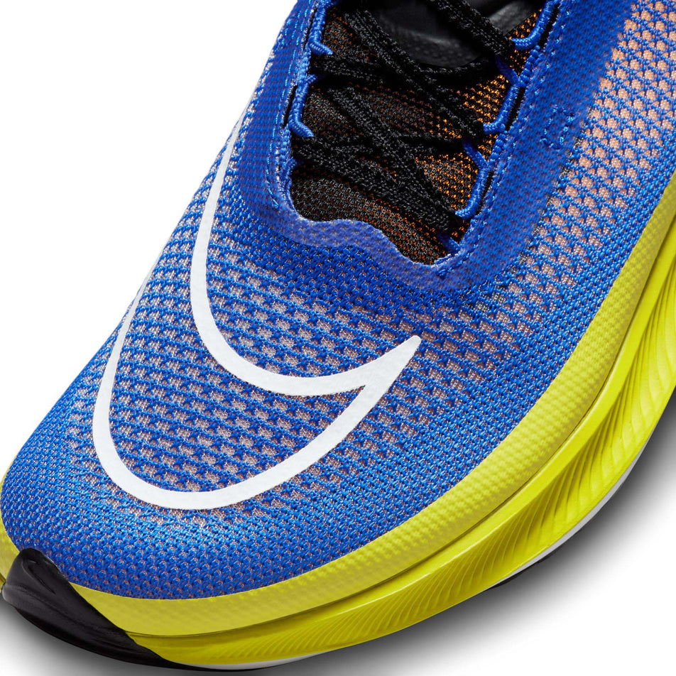 Lateral side of the toe box on the left shoe from a pair of Nike Men's Streakfly Road Racing Shoes in the Racer Blue/White-Black colourway (7970596716706)