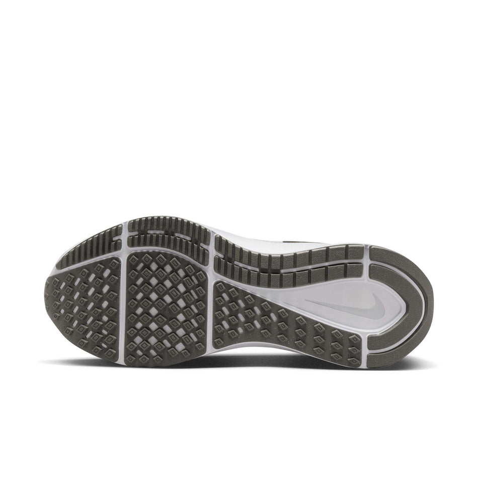 Outsole of the left shoe from a pair of Nike Men's Structure 25 Road Running Shoes in the Black/White-Iron Grey colourway (8139357782178)