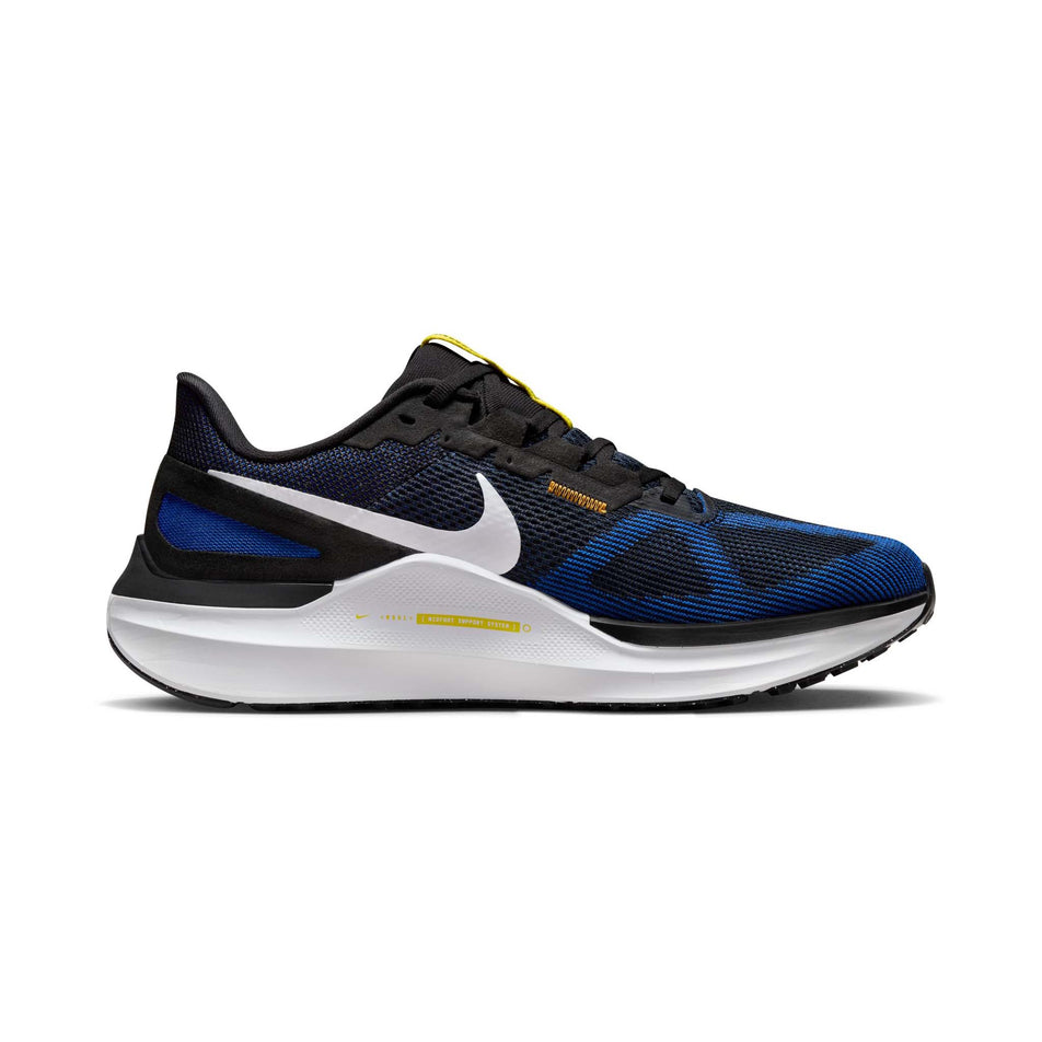 Medial side of the left shoe from a pair of Nike Men's Structure 25 Road Running Shoes in the Black/White-Racer Blue-Sundial colourway (8025956745378)