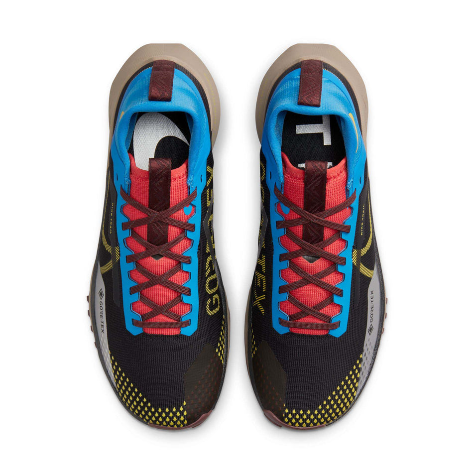 The uppers on a pair of Nike Men's Pegasus Trail 4 GORE-TEX Waterproof Running Shoes in the Black/Vivid Sulfur-LT Photo Blue colourway (8023256727714)