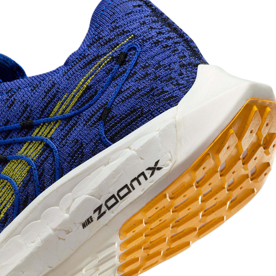 Lateral side of the left shoe's heel, from a pair of Nike Men's Pegasus Turbo Road Running Shoes in the Racer Blue/High Voltage-Black-Sundial colourway (7970640265378)