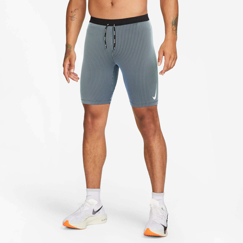 Front view of a model wearing a pair of Nike Men's Dri-FIT ADV AeroSwift 1/2-Length Racing Tights in the Black/Polar/Mineral/White colourway (7979936743586)
