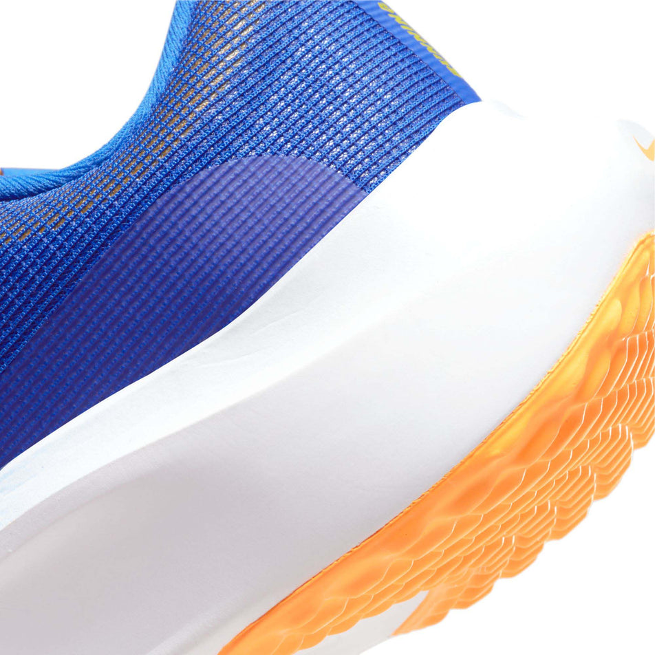 Side of the heel on a shoe from a pair of Nike Men's Zoom Fly 5 Road Running Shoes in the Racer Blue/White-High Voltage-Sundial colourway (7970692202658)