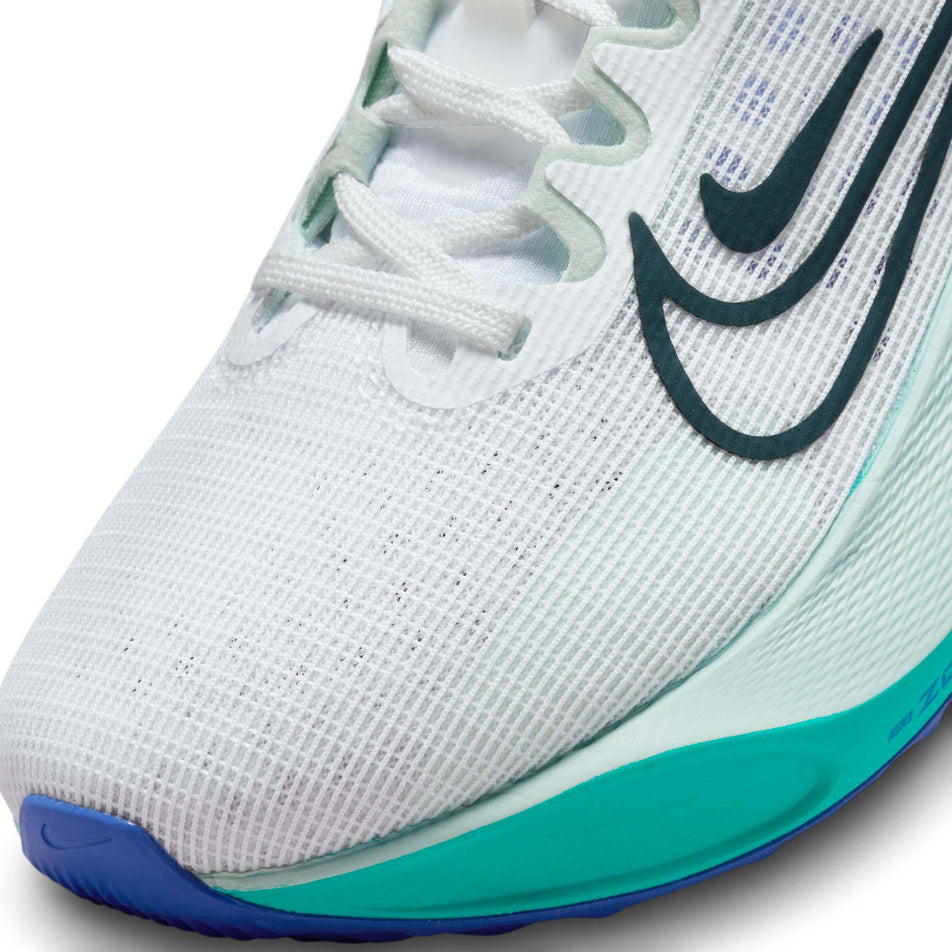 Lateral side of the toe box on the left shoe from a pair of Nike Women's Zoom Fly 5 Road Running Shoes in the White/Deep Jungle-Clear Jade colourway (7995912192162)