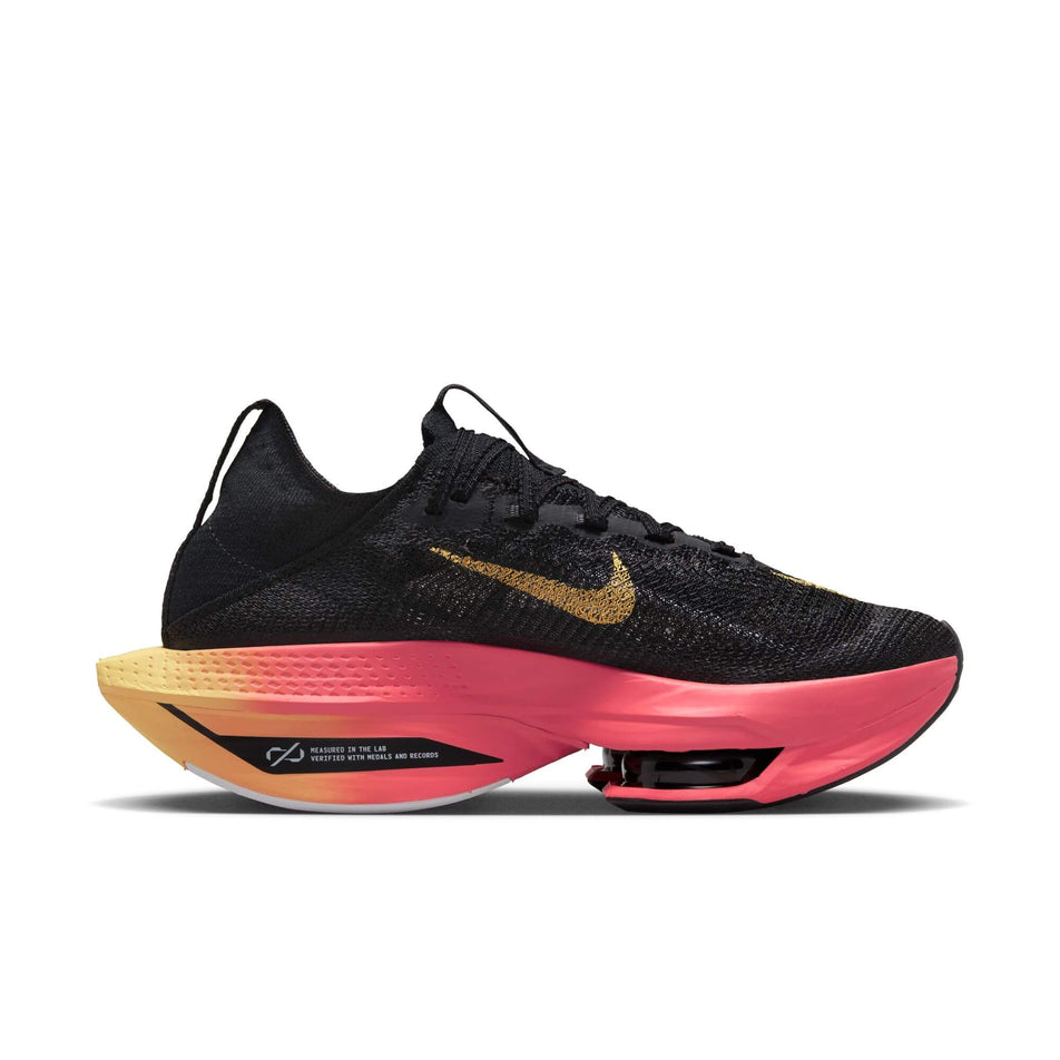 Medial side of the left shoe from a pair of Nike Women's Alphafly 2 Road Racing Shoes in the BLACK/TOPAZ GOLD-SEA CORAL-WHITE colourway (7870344462498)
