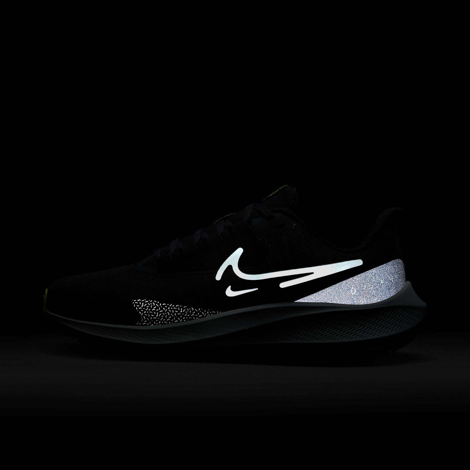 The reflectivity on the lateral side of the left shoe from a pair of Nike Women's Pegasus 39 Shield Weatherized Road Running Shoes. Black/White-Dk Smoke Grey-Volt colourway. (8073034006690)