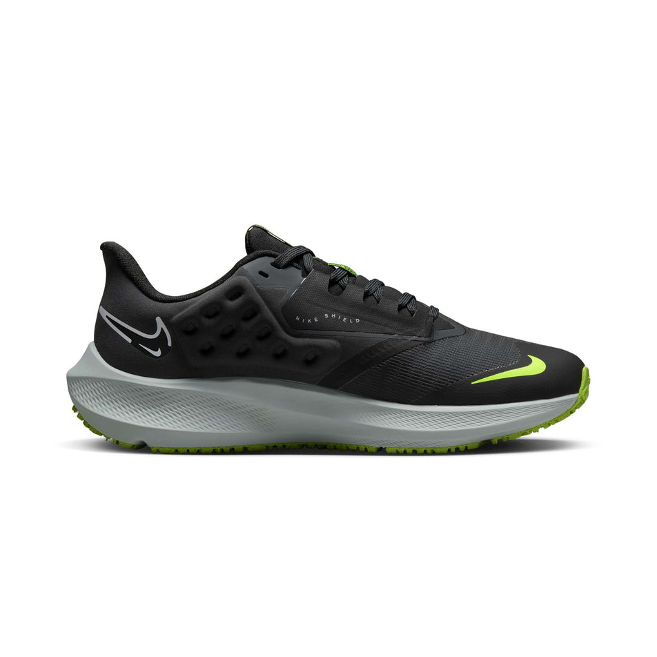 Medial side of the left shoe from a pair of Nike Women's Pegasus 39 Shield Weatherized Road Running Shoes. Black/White-Dk Smoke Grey-Volt colourway. (8073034006690)