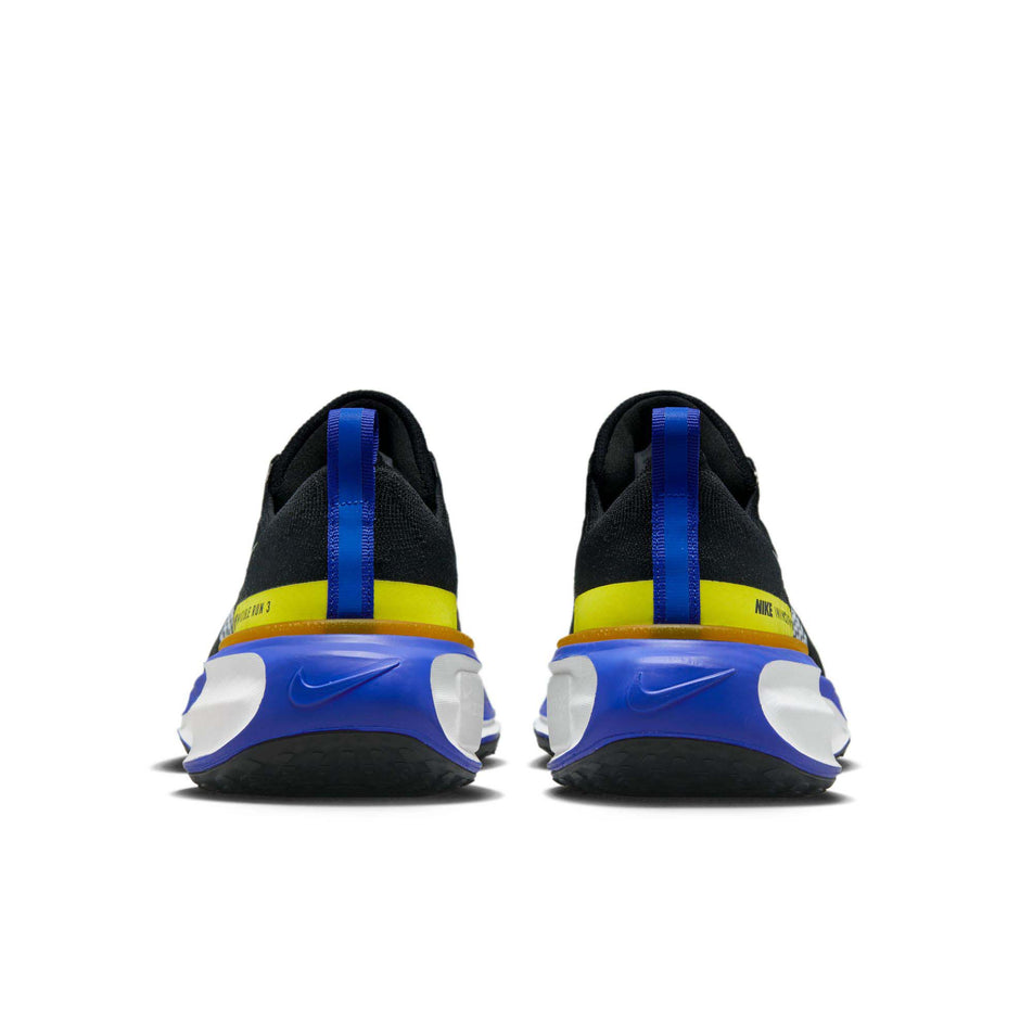 The back of a pair of Nike Men's Invincible 3 Road Running Shoes in the Black/White-Racer Blue-High Voltage colourway (7970751381666)